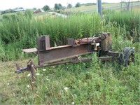 Log splitter on Army trailer