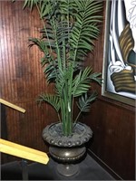 Metal planter with contents. Stones and faux