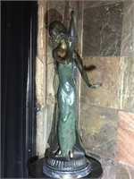 Standing girl with peacock. By Michael S. 32x11.