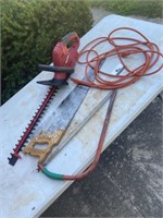 Hedge trimmers and saws