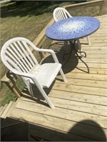 Mosaic tile table and two lawn chairs