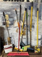 11 - LOT OF BROOMS, MOPS & DUST PANS