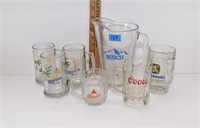 assorted beer brand mugs and pitcher