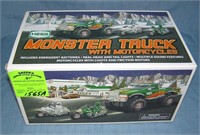 Vintage Hess monster trucks with motor cycle scarc