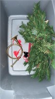 Bin with garland and mini horn