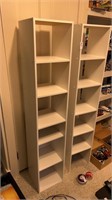 Pair of white wooden shelving units