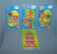 Group of vintage toys includes Fisher Price