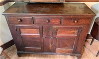 Antique hutch cabinet with three drawers above
