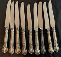9 dinner knives with sterling silver handles