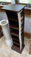 CD rack wooden with a piano design on the right