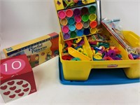 Children's toys in tote, play-doh with cutters and
