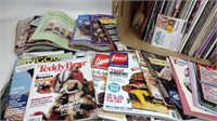 Assortment of magazines, including Knitting