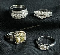 4 sterling rings w/stones. Total weight: 26.1