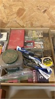 Paint brush, screws, tape measure, bungee cords