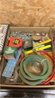 Tape measures, markers, electrical tape, chain,