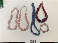 4 necklaces, bracelet