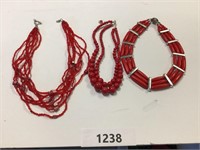 3 red necklaces