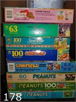 Lot of puzzles including Peanuts+