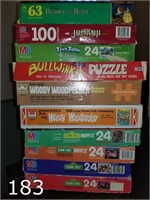 Lot of puzzles including Sesame Street