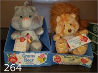 2 Care Bears in boxes