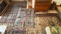 Lot of five oriental rugs in various sizes- all