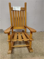 Wooden doll rocker.