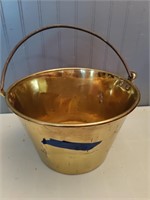 Brass bucket.