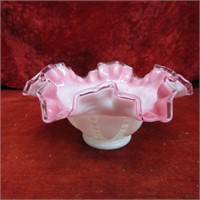 Pink crest ruffled glass vase.