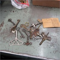 Clock & assorted old keys.