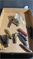 Flat of pocket knives