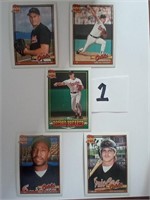 assortment of Orioles sport cards