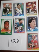 Assortment of Topps football cards