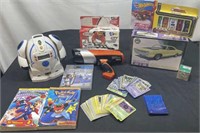 Entertainment Lot; Pokémon Cards, Speed Gun & More