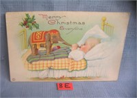 Christmas post card features a child with a Dumbo