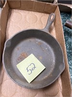 CAST IRON SKILLET MARKED WITH THE LETTER "H"