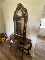 Wooden vanity with matching mirror