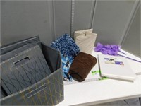Fabric organizer bins (some never used), rug, towe