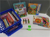 Children's books in a plastic crate