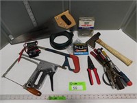 Hatchet, staples and stapler, wire rope, hack saw,