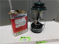 Coleman lantern and partial container of fuel
