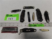 Folding knives and a multi-tool