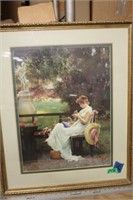 Lady Sitting in Garden Framed Print
