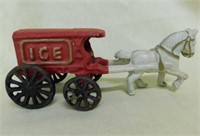 3 new cast iron horse and wagon figurines,