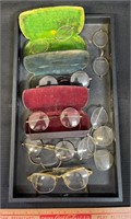 NEAT COLLECTION OF ANTIQUE EYE GLASSES & CASES