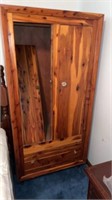 Cedar wardrobe door needs put back on