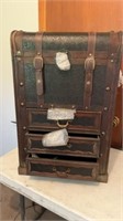 Small trunk with drawers and flip open lid.  Cool
