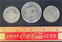 THREE CANADIAN COMMEMORATIVE ONE DOLLAR COINS