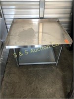 Stainless Steel table/stand 36" x 30"d X 24" tall