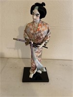 Vintage geisha doll