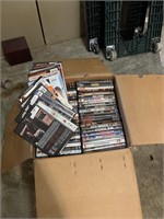 Box of approximately  150 DVDs
